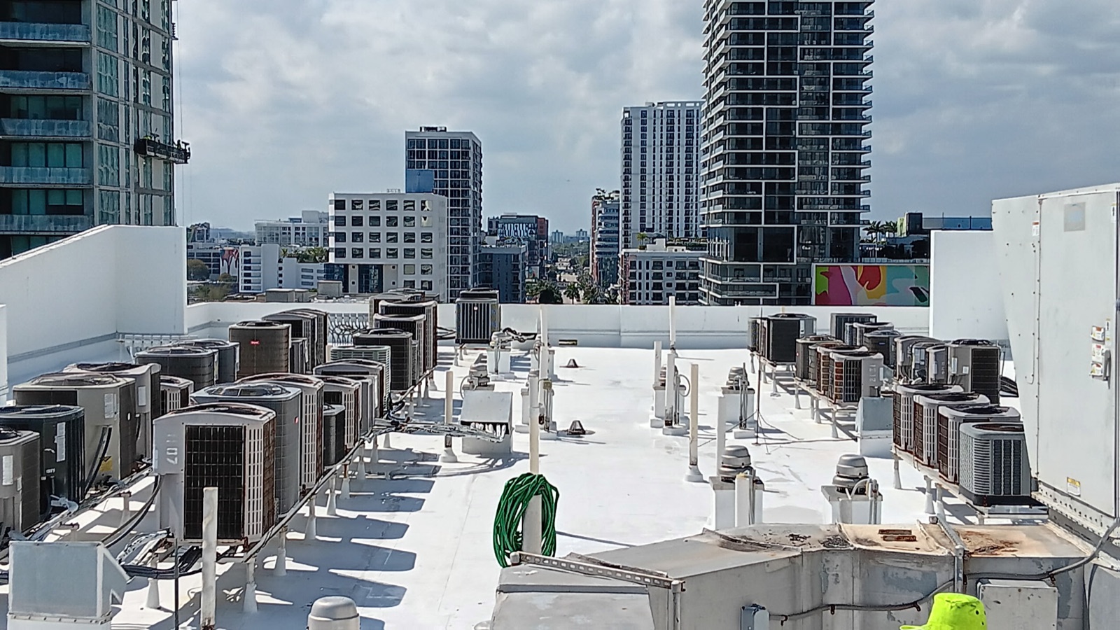 Panoramic view of commercial flat roof with Miami skyline