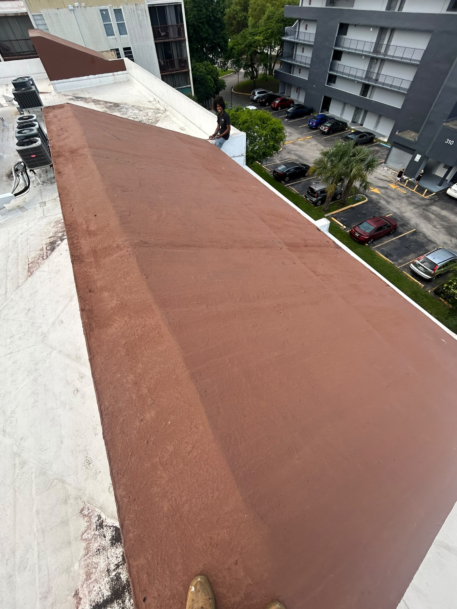 Flat roof elastomeric coating application