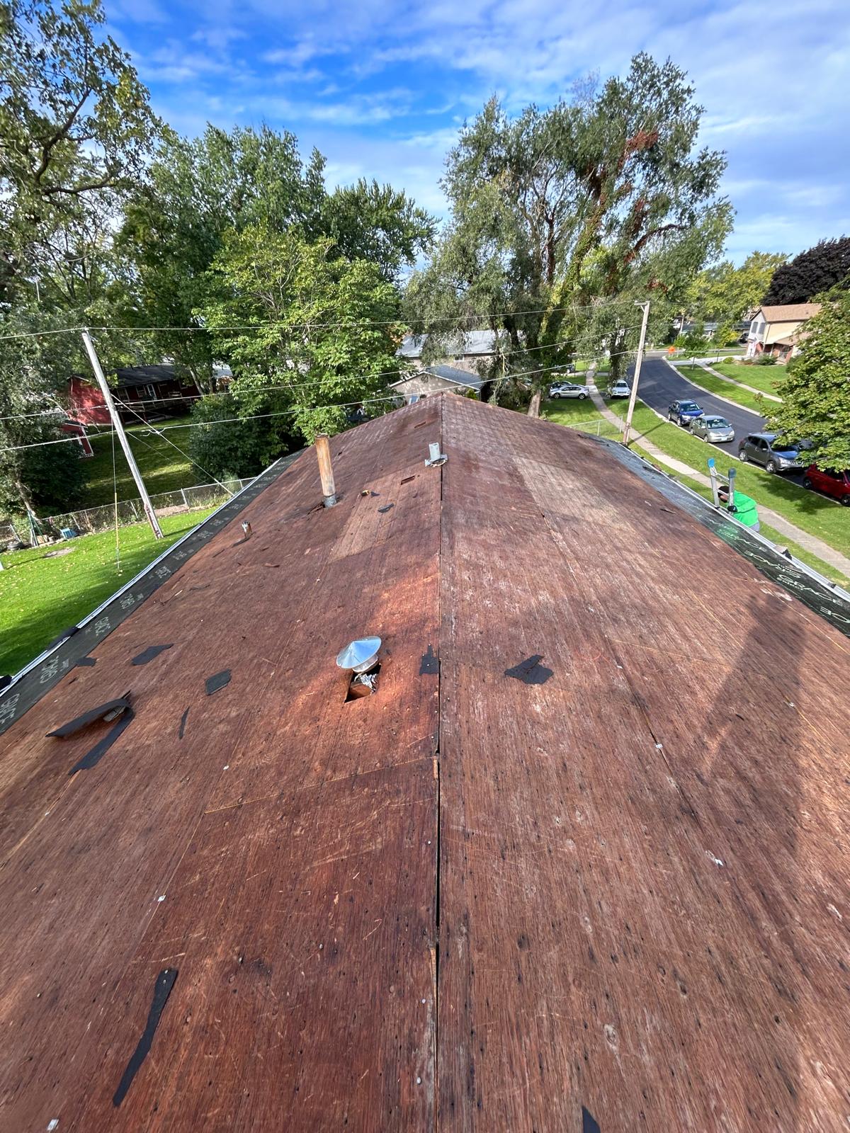 Roof tear-off and plywood decking replacement