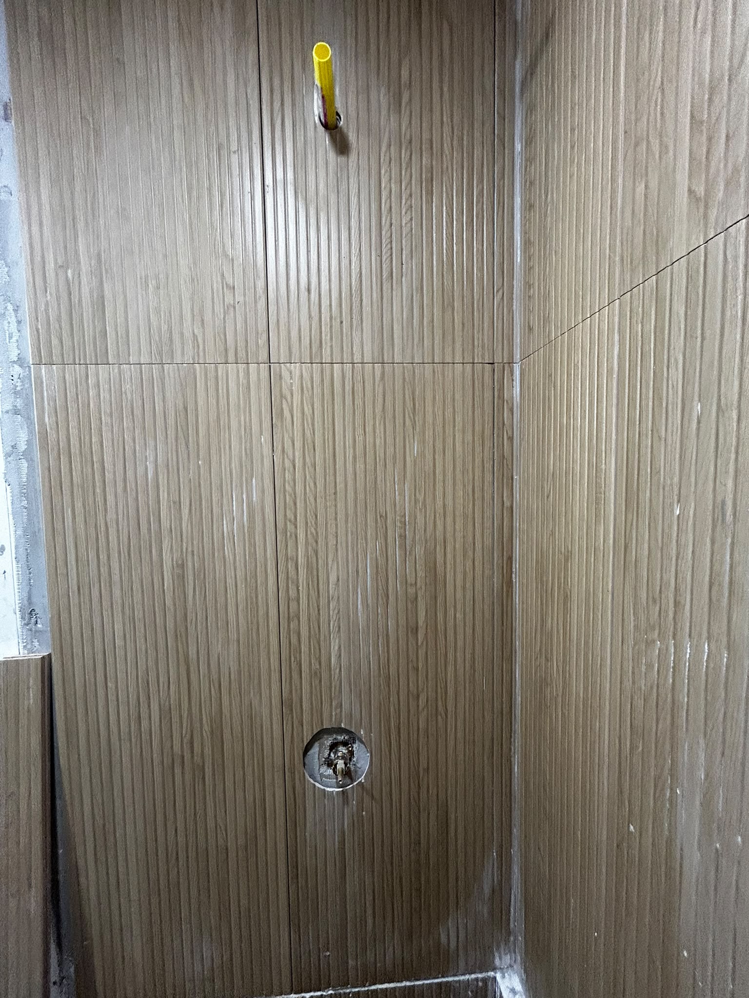 Ribbed porcelain wall tile installed in shower